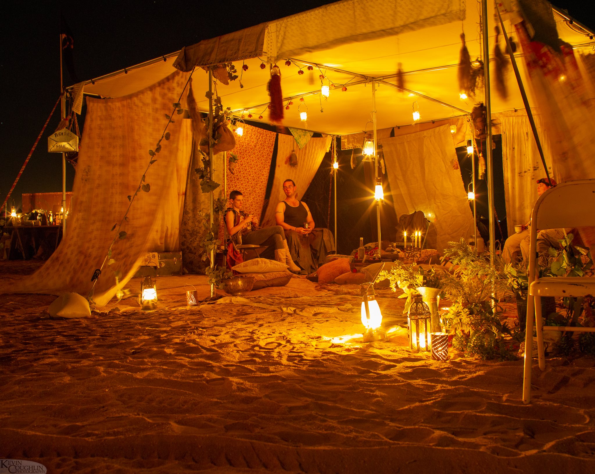 The Clan of the Boltcutters Camp lit at night